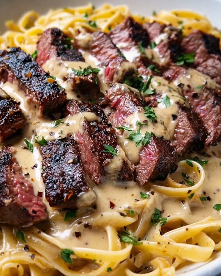 Spicy Cajun Steak with Creamy Alfredo Pasta Recipe