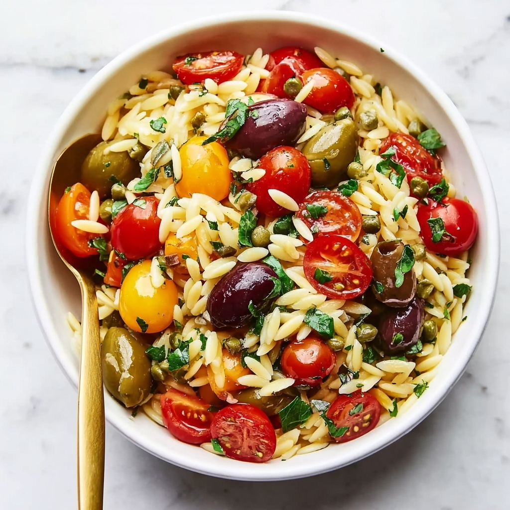 Orzo Pasta Salad with Cherry Tomatoes, Artichokes, Kalamata Olives, and Grilled Chicken Recipe - Recipe Image
