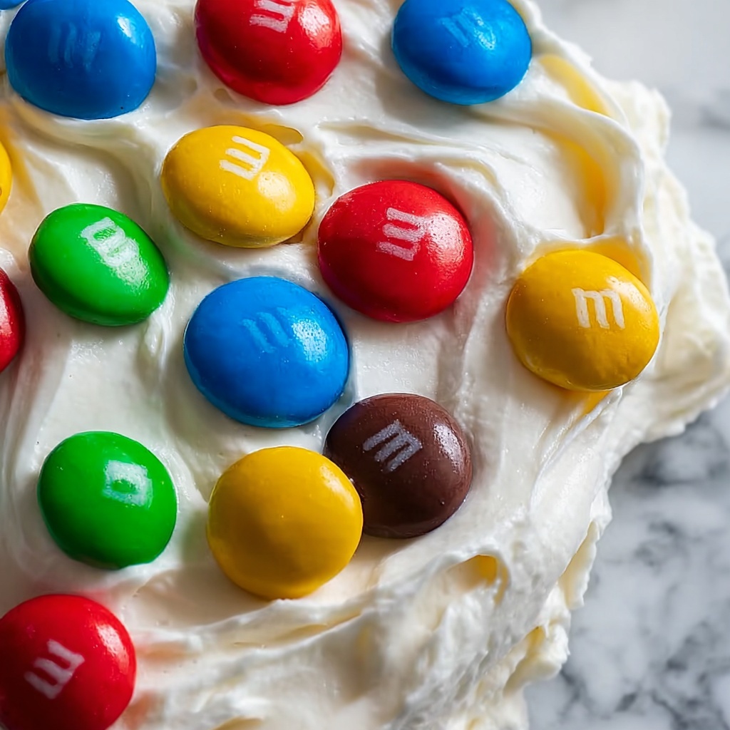 M&Ms Cool Whip and Pudding Frosting Recipe - Recipe Image