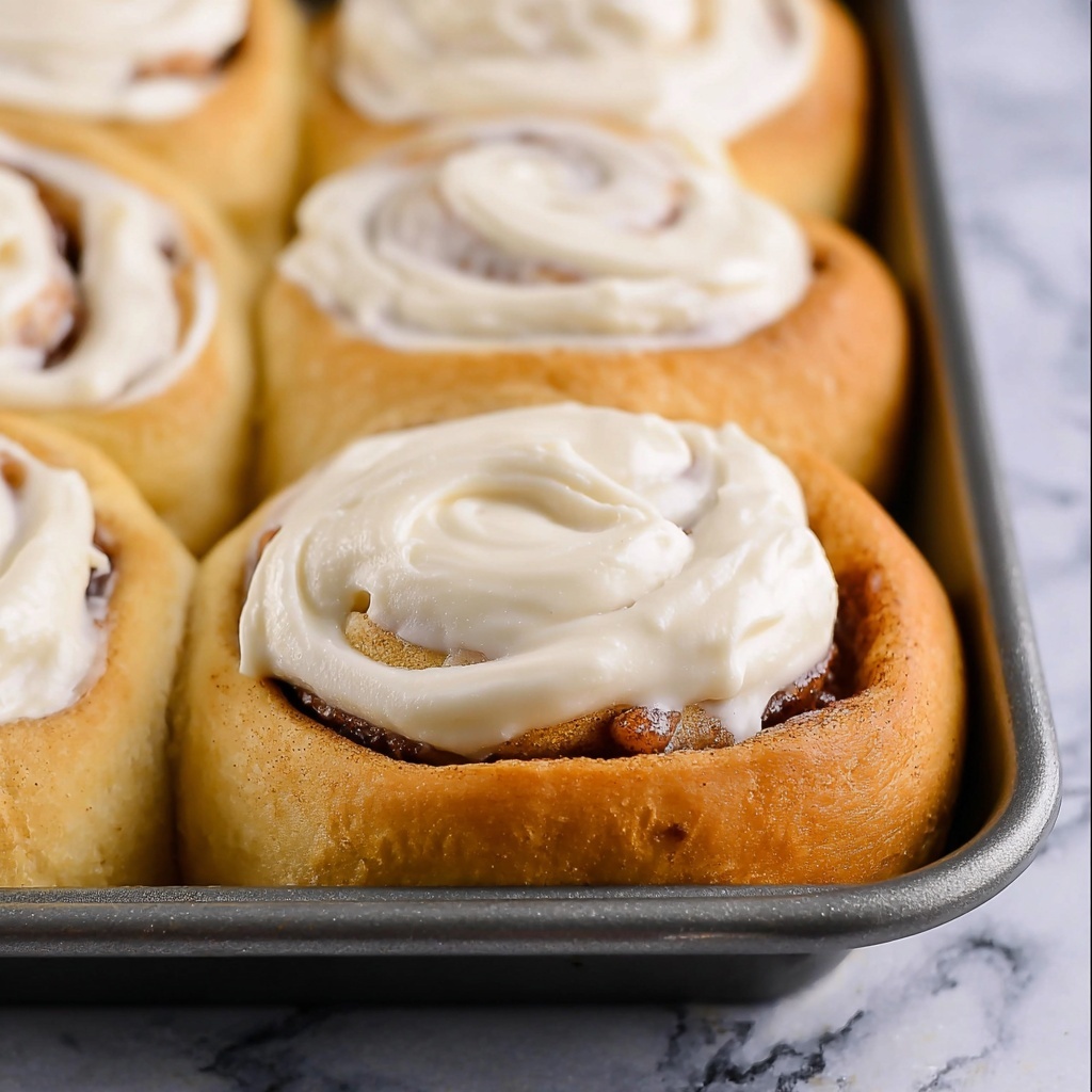 Homemade Cinnamon Rolls with Maple Cream Cheese Frosting Recipe - Recipe Image